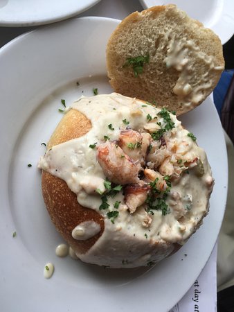 Fog Harbor Fish House signature dishes Clam chowder Scallop and Crab RisottoDungeness CrabSurf and Turf